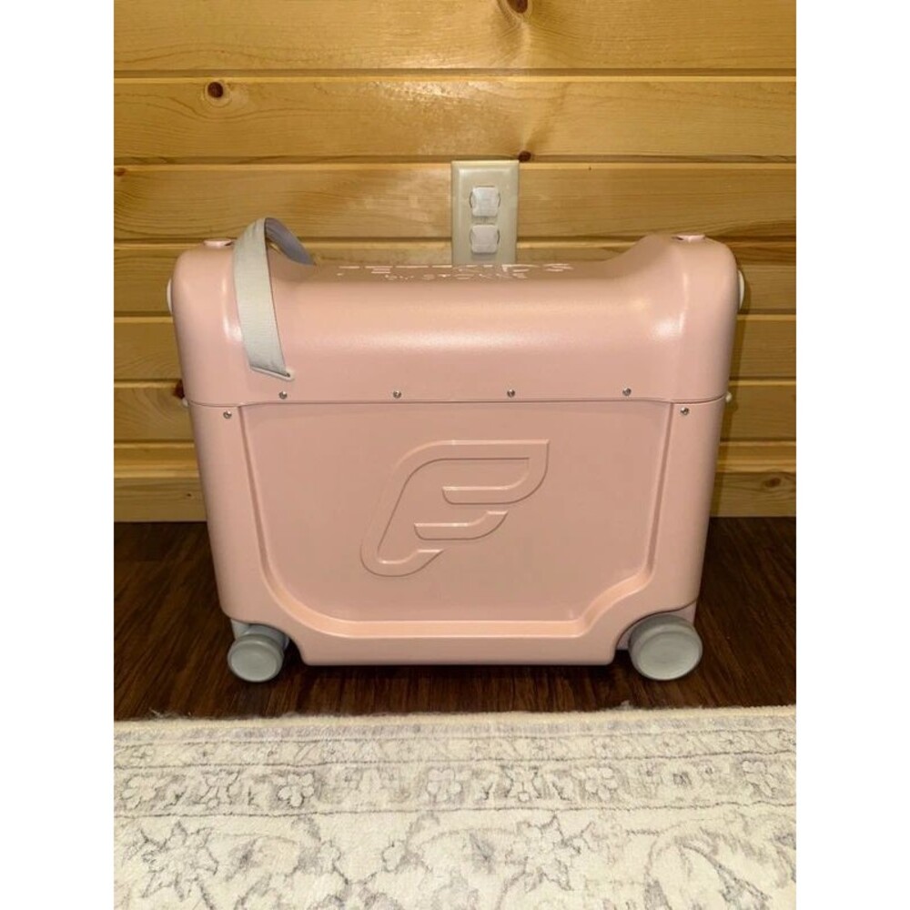 Stokke JetKids BedBox rolling, ride on, carry on suitcase for kids